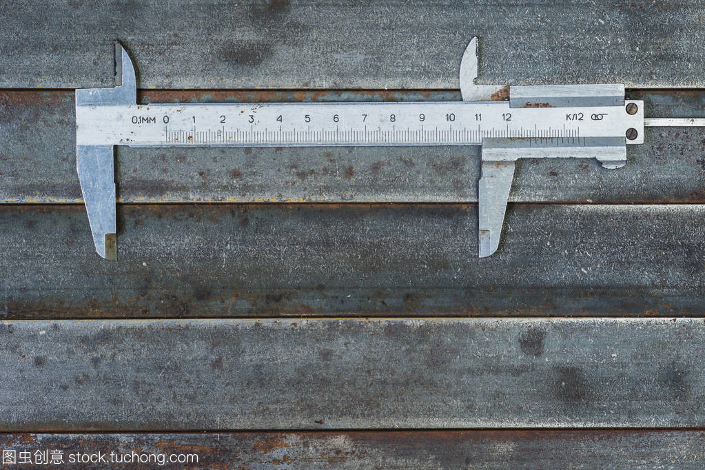 測量工具,金屬背景。背景紋理